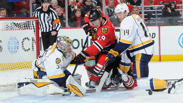 Jonathan-Toews-Predators-Bill-Smith.jpg